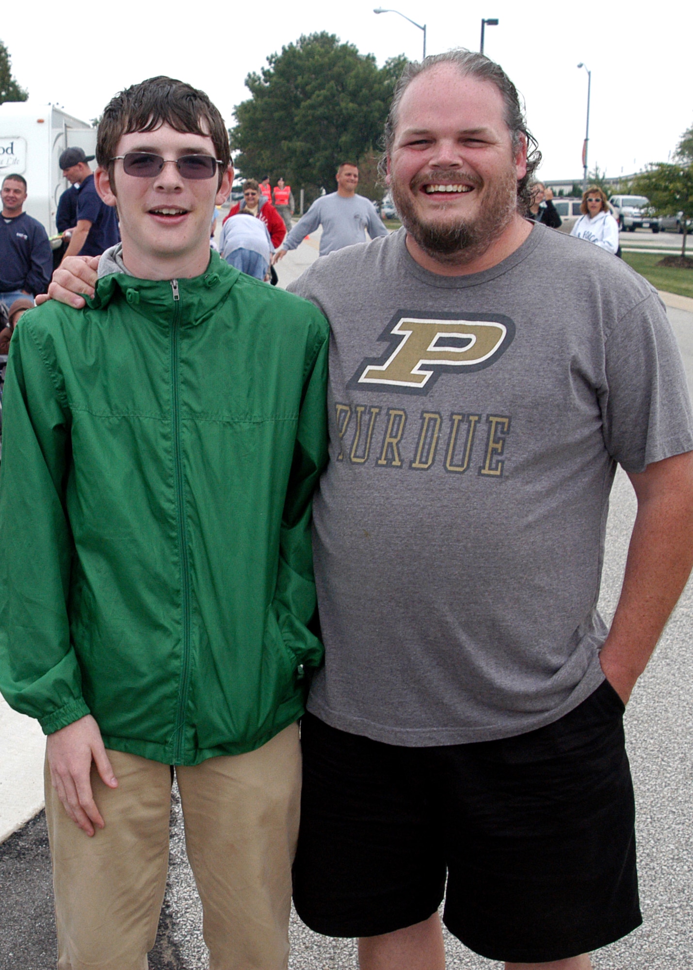 GRISSOM AIR RESERVE BASE, Ind. -- Ken and Justin Stepp pose for a photo after winning an egg toss, which earned points for the 434th Maintenance Group in a Commander's Cup challenge. The Commander's Cup was a competition between the 434th Operations Group, 434th Support Group and 434th MXG, in which Airmen and their family members competed in activities such as a sphere competition, pie eating contest, egg toss and seed spitting. (U.S. Air Force photo/Senior Airman Carl Berry)