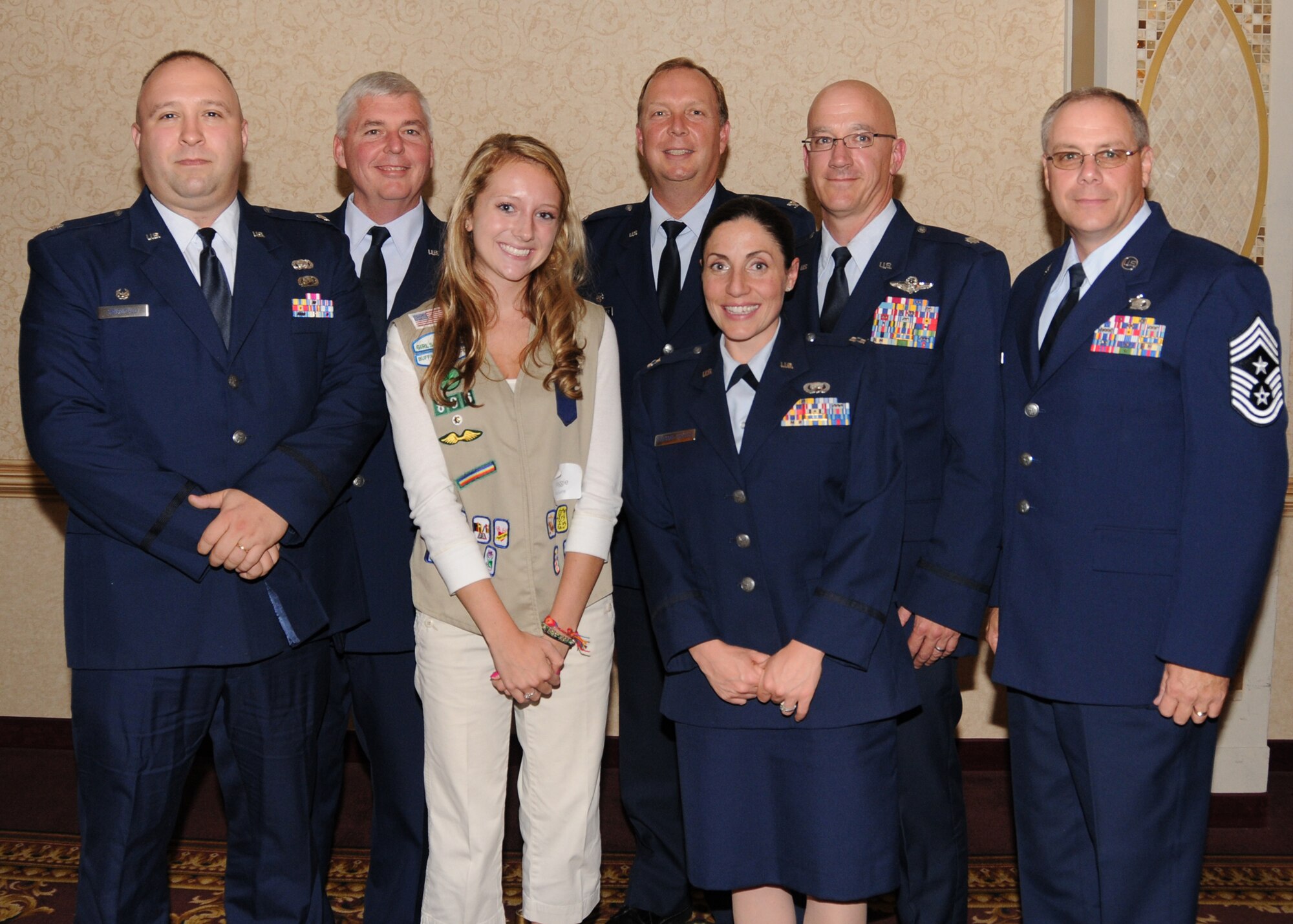 Captain Gina Pizziconi-Cupples, the 914th Logistics Readiness Squadron commander receives the Girl Scouts of Western New York's 2010 Women of Distinction Award for the Armed Services Category September 14, 2010. Buffalo, NY. Pizziconi-Cupples was nominated for her work in the United States Air Force including Process Improvement Initiatives that the 914th Airlift Wing has benefitted from in the past 12-15 months. (U.S. Air Force photo by Staff Sgt. Joseph McKee)