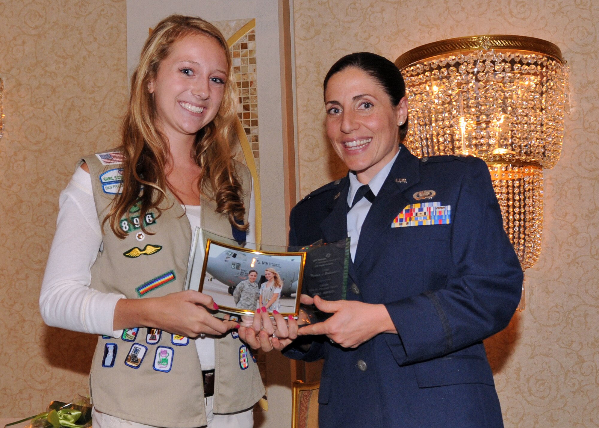 Captain Gina Pizziconi-Cupples, the 914th Logistics Readiness Squadron commander receives the Girl Scouts of Western New York's 2010 Women of Distinction Award for the Armed Services Category September 14, 2010. Buffalo, NY. Pizziconi-Cupples was nominated for her work in the United States Air Force including Process Improvement Initiatives that the 914th Airlift Wing has benefitted from in the past 12-15 months. (U.S. Air Force photo by Staff Sgt. Joseph McKee)