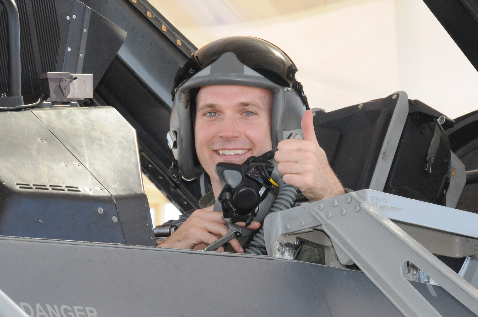 Master Sgt. Stephen Hunter, 944th Civil Engineer Squadron explosive ordnance disposal technican, gives a "thumbs up" before his F-16 flight Sept. 9. Sergeant Hunter in one of the 12 Outstanding Airmen of the Year for 2010 and will travel to Washington DC to receive his award in September. (U.S. Air Force photo/Tech. Sgt, Susan Stout)
