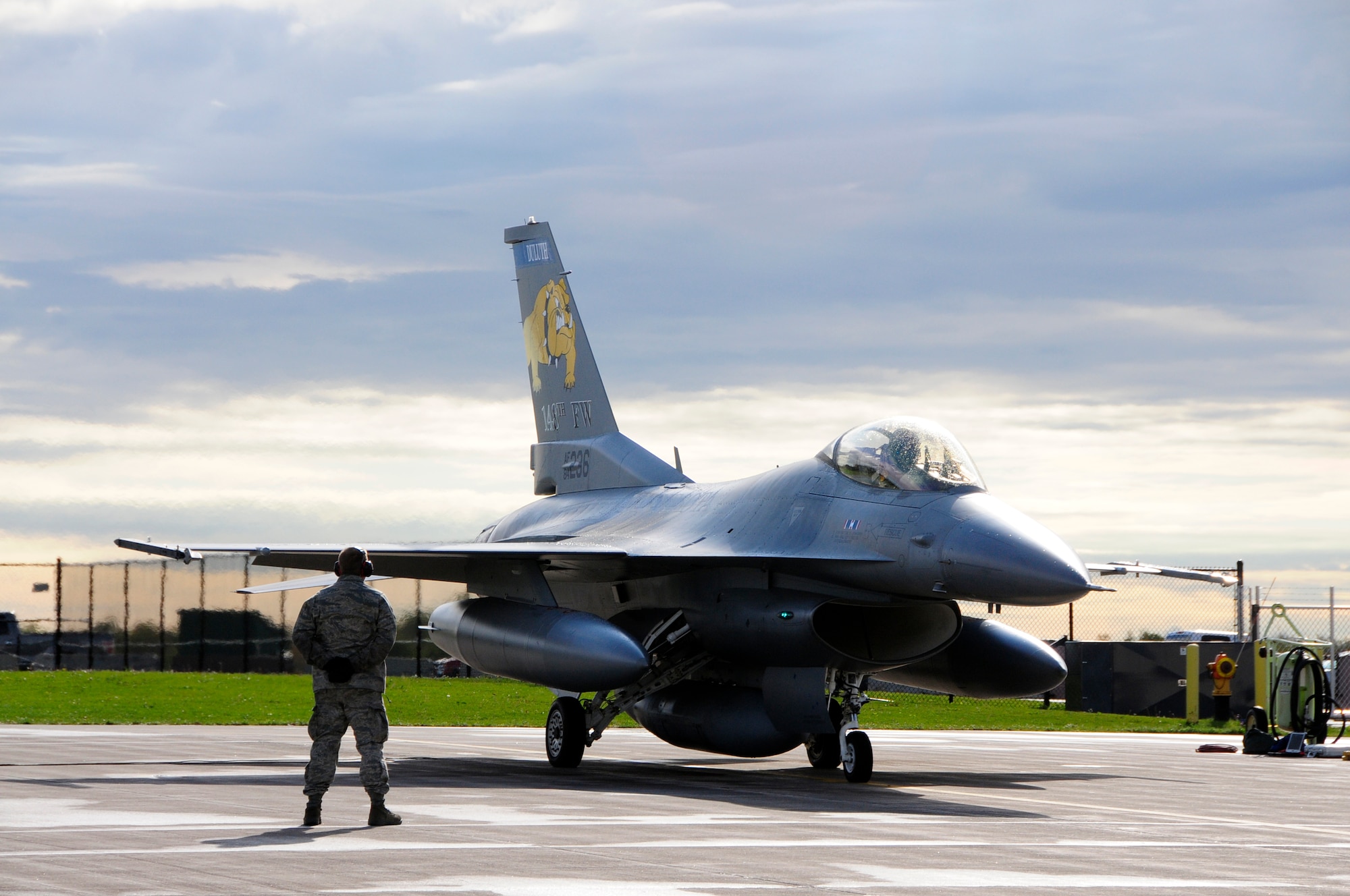 SSgt Charles Thurber stands by as the last Block 25 F-16 prepares for it's final departure flight on Sept. 14, 2010 at the 148th Fighter Wing Air National Guard Base in Duluth, Minn.  The 148th FW has transitioned to the Block 50 F-16 and this Block 25 was the last to be replaced.  (U.S. Air Force photo by SMSgt Ralph Kapustka)