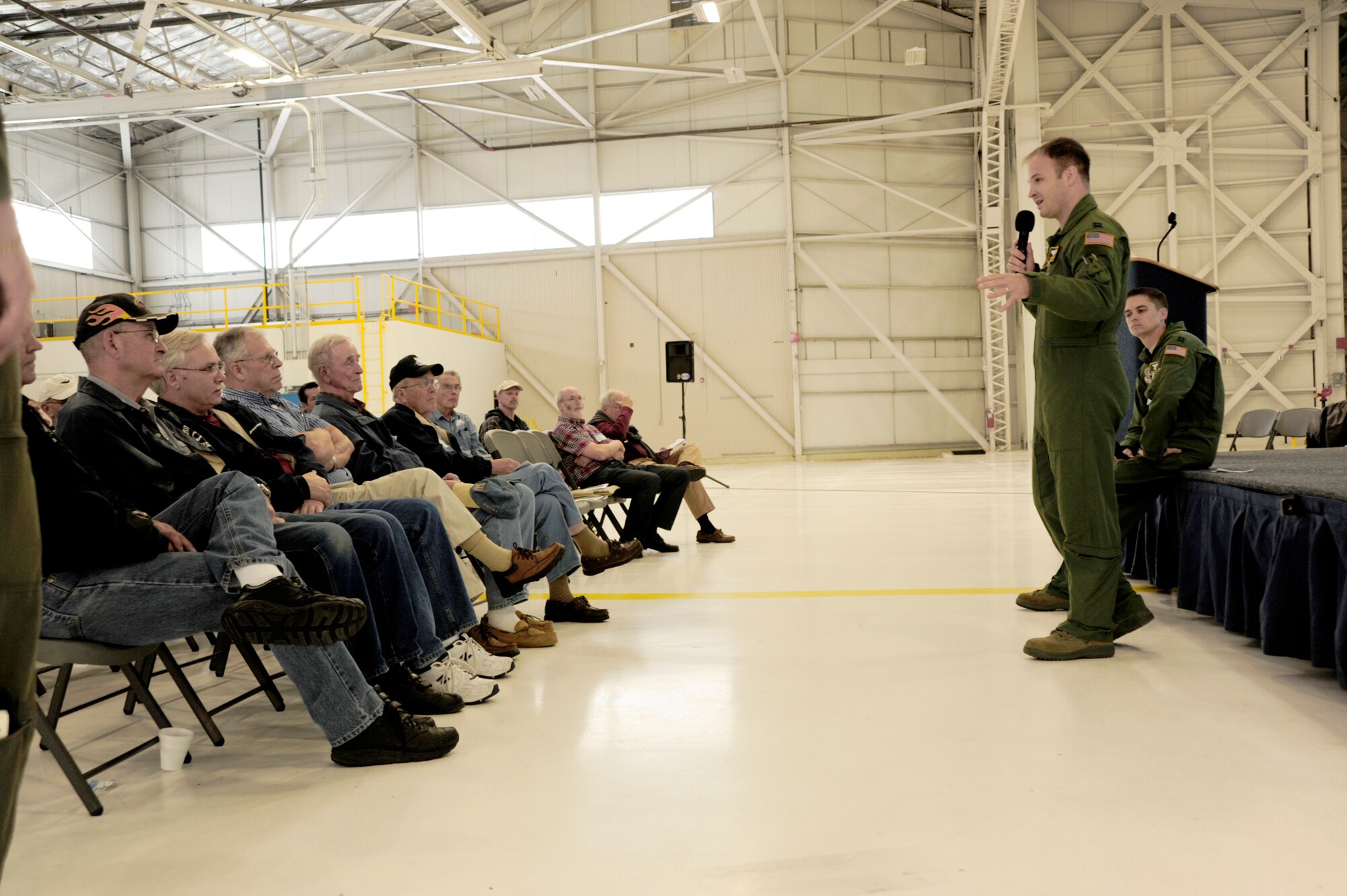 Capt. Zachary Dorman speaks to a group of guests at the Joint Skies Seminar Sept. 9, 2010 at Joint Base-Lewis McChord, Wash. The group discussed information and resources in an effort to ensure safer airspace by bringing the Northwest aviation community together. Captain Dorman is a 62nd Airlift Wing flight safety officer and Joint Skies Seminar lead organizer (U.S. Air Force Photo/Airman Leah Young)