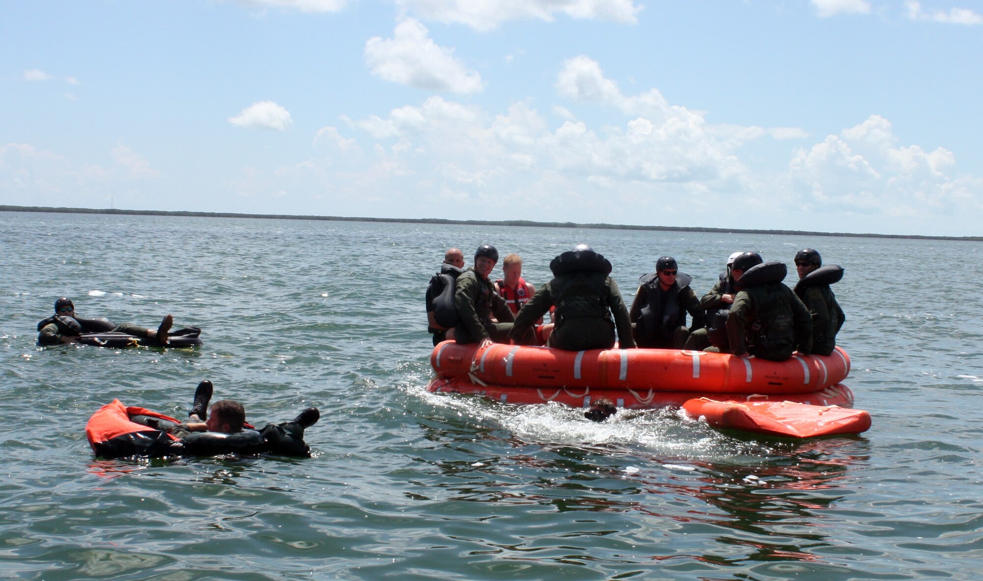 Pilots from the 93rd Fighter Squadron at Homestead Air Reserve Base, Fl prepare to begin a water survival exercise in Key Largo, Fl, Sept. 12. The training was part of a two-day event that included signalling, survival kit familiarization, land navigation and land and water survival training. (U.S. Air Force photo/ Senior Airman Katie Spencer)