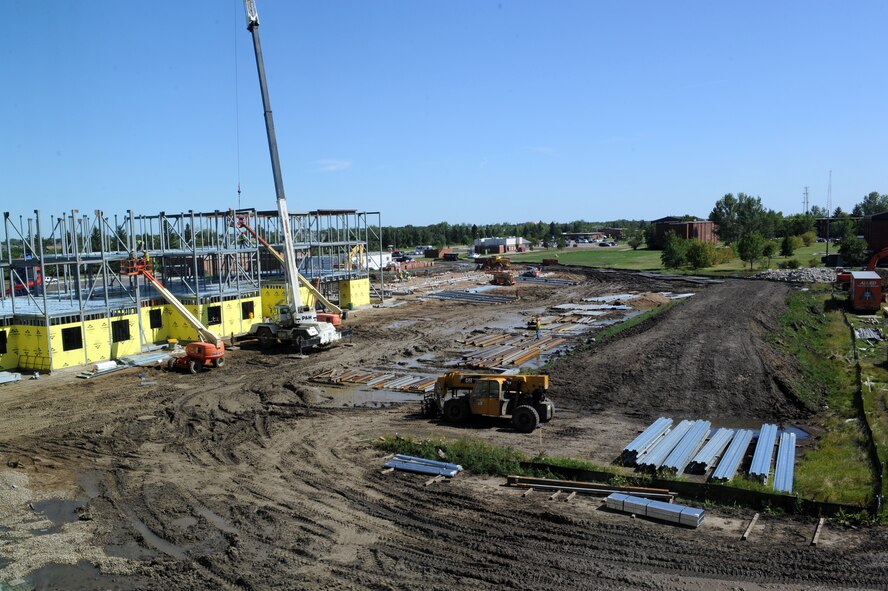 MINOT AIR FORCE BASE, N.D. -- Building continues on a new dormitory here Sept. 8. This construction is part of an ongoing effort to better the quality of life for all Airmen living on base in the dormitories. (U.S. Air Force photo by Airman 1st Class Aaron-Forrest Wainwright)