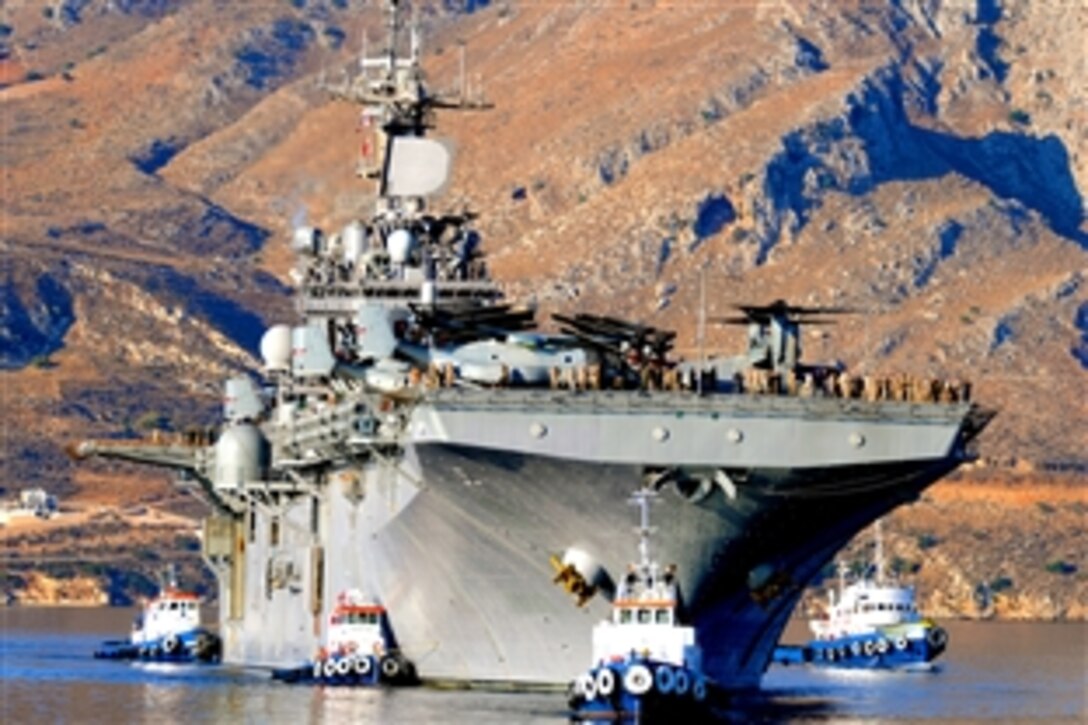 The amphibious assault ship USS Kearsarge and the embarked 26th Marine Expeditionary Unit arrive in Souda Bay, Greece,  Sept. 13, 2010, for a brief port visit. The Kearsarge is en route to provide food, water, transportation, and other support to flood victims in Pakistan.