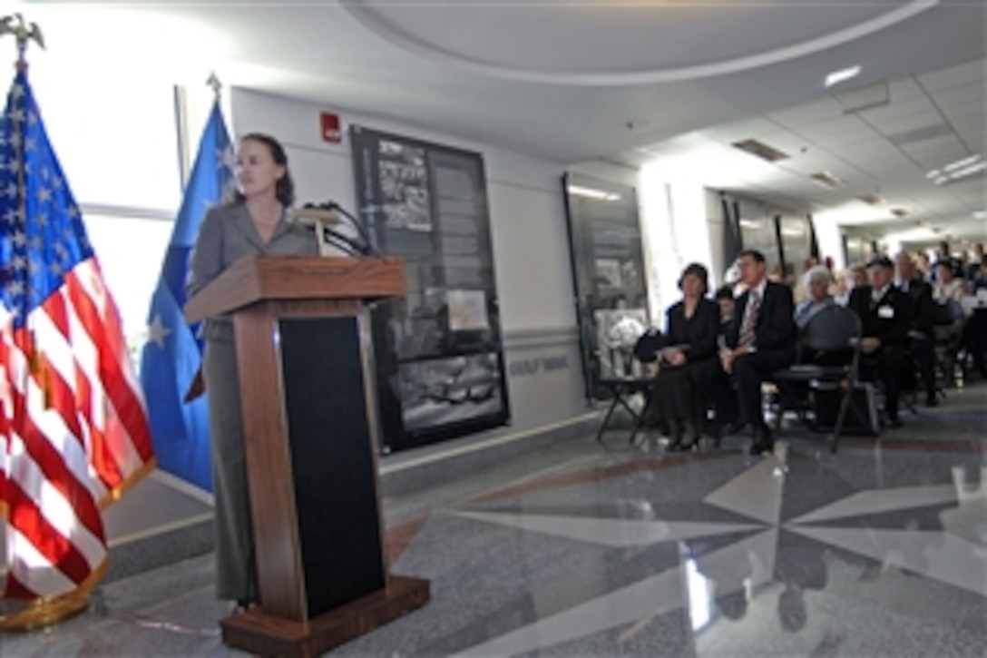 Michele Flournoy, the Defense Department's policy chief, talks about the importance of the military's mission to recover all prisoners of war and those missing in action during a Pentagon ceremony Sept. 15, 2010. Flournoy helped dedicate a Pentagon corridor to American military prisoners of war and those missing in action.