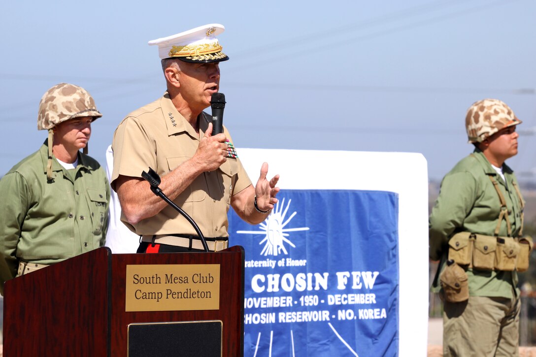 The 34th Commandant of the Marine Corps, Gen. James T. Conway, speaks during a monument dedication ceremony, Sept. 15, in honor of those who gave their lives at the Chosin Reservoir. The Camp Pendleton South Mesa Club now exhibits the 3,000 pound granite monument to remind those present of the military's service and sacrifice during the reservoir's bitter campaign in which the 1st Marine Division fought a prodigious battle.