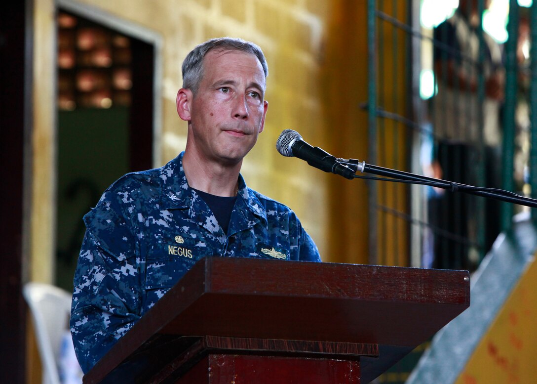 U.S. Navy Capt. Thomas M. Negus, commodore of Operation Continuing Promise 2010 (CP10), gives his remarks while attending the opening ceremony of humanitarian assistance operations at a medical site in Bluefields, Nicaragua, Sept. 16, 2010. Service members and civilians are deployed in support of CP10, providing humanitarian assistance, disaster relief and subject-matter exchanges to the Caribbean, Central and South America.