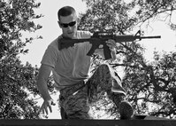Staff Sgt. Josiah Wood, 919th Security Forces Squadron, leaps to the next obstacle during a bound and overwatch training procedure Sept. 12 during the UTA weekend. (U.S. Air Force photo/Samuel King Jr.)
