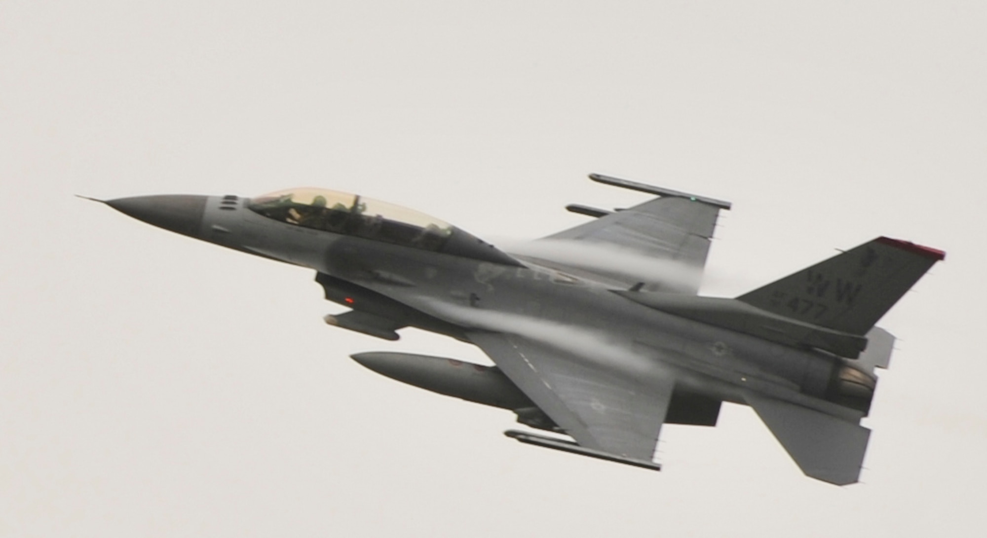 A 13th Fighter Squadron F-16 Flying Falcon fires high-angle strafe patterns using high explosive-incendiary ammunition, during pre-deployment training at Draughon Range, north of Misawa Air Base, Japan, Sept. 16, 2010. (U.S. Air Force photo/Tech. Sgt. Russell McBride/Released)