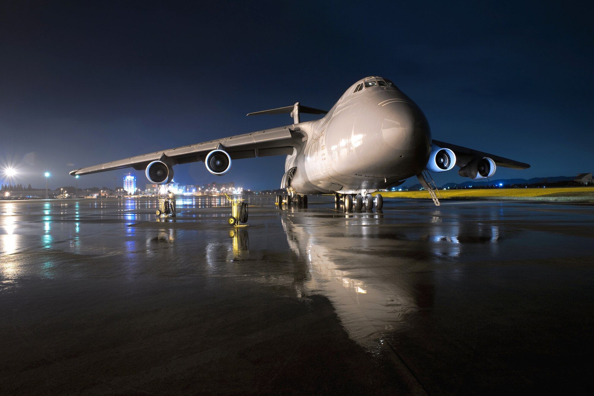 YOKOTA AIR BASE, Japan -- A 60th Air Mobility Wing C-5 Galaxy aircraft assigned to Travis Air Force Base, prepares for take off here Sept. 15. As the airlift hub of the western Pacific, Yokota Airmen work 24/7 operations to keep inbound and outbound aircraft running. (U.S. Air Force photo/Osakabe Yasuo)