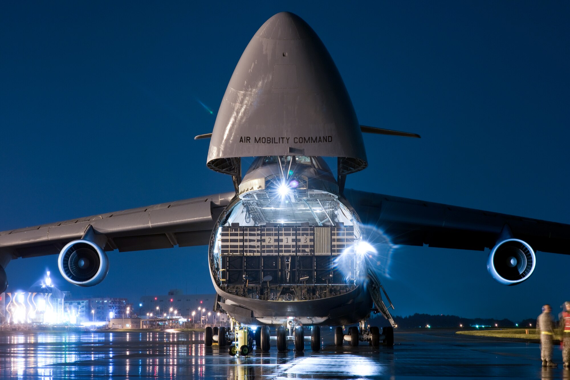 YOKOTA AIR BASE, Japan -- A 60th Air Mobility Wing C-5 Galaxy aircraft assigned to Travis Air Force Base, with nose visor raised on the flightline here Sept. 15. Airmen from the 730th Air Mobility Squadron performed a two hour quick turn on the C-5 as part of normal duty operations. (U.S. Air Force photo/Osakabe Yasuo)
