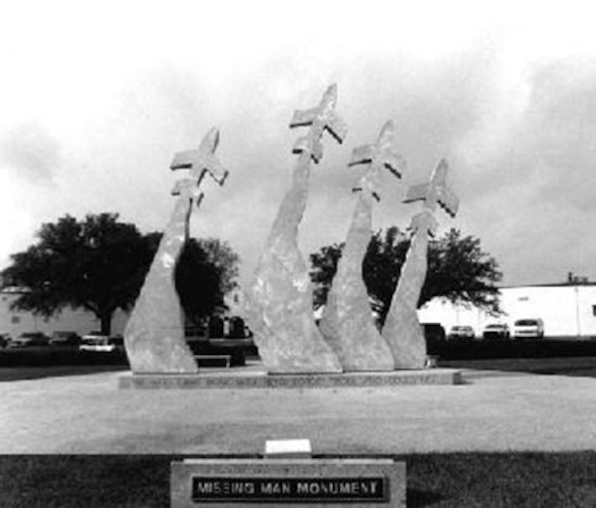 The Missing Man Monument was sculpted by artist Mark Pritchett and depicts three planes flying side-by-side and one plane flies alone representing the United States Air Force Thunderbird Aerial Demonstration Team's version of the missing man formation to salute fallen comrades.  The monument was dedicated on Mar. 4, 1977 at Randolph AFB, Texas. (U.S. Air Force Photo)