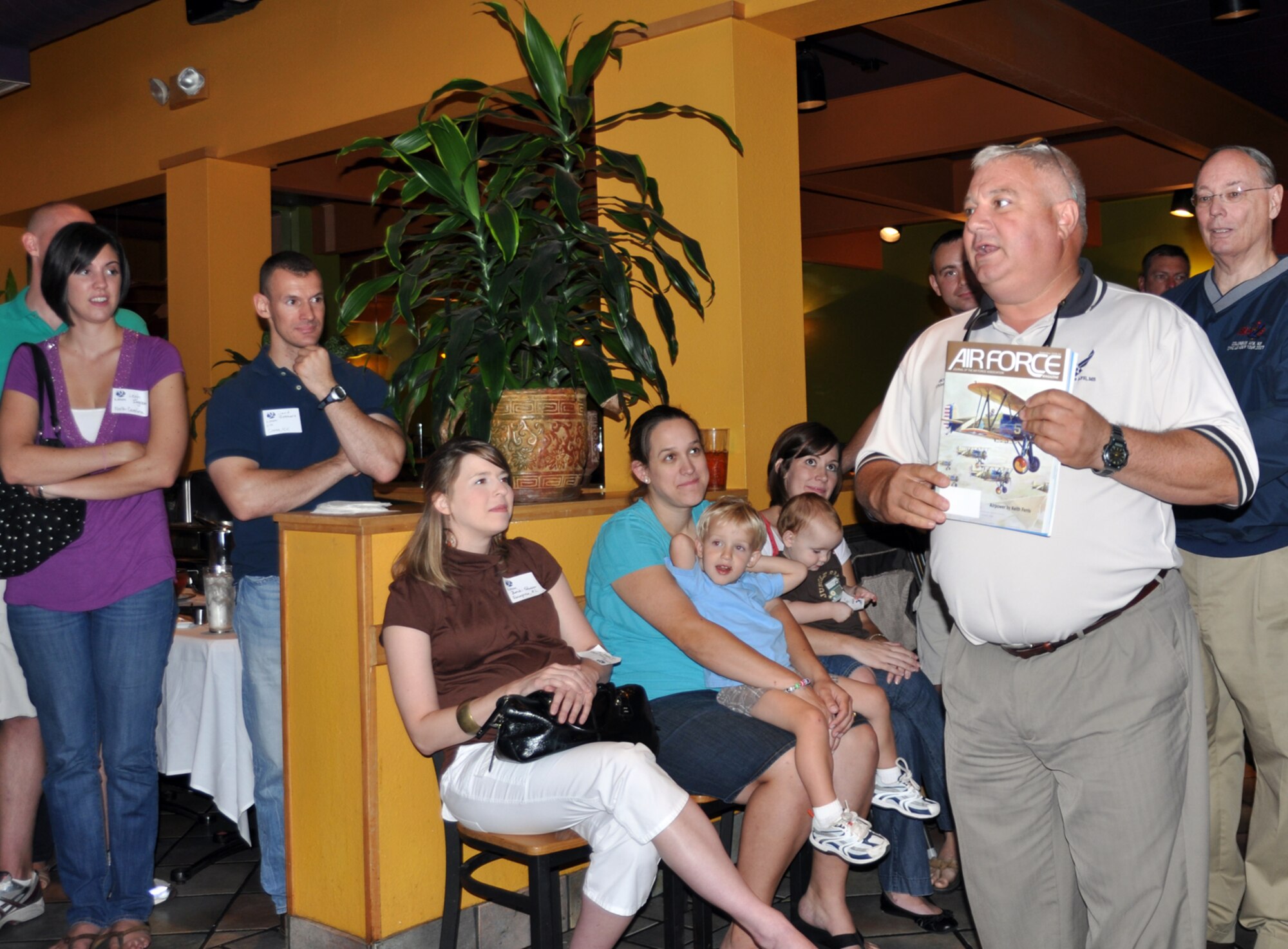 Specialized Undergraduate Pilot Training Class 11-14 listens to local Air Force Association Vice President Rick “Sonic” Johnson during the pilot partner reception on Sept. 14 at The Grill in downtown Columbus, Miss. The pilot partner welcome gives new SUPT students and local community leaders an opportunity to interact and introduce students to the some of the local community programs. (U.S. Air Force photo/Airman 1st Class Chase Hedrick).