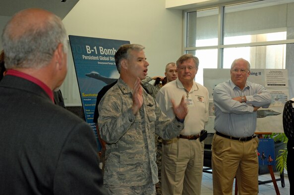 Brig. Gen. Walter Givhan speaks to civic leaders during a tour of the Aeronautical Systems Center acquisition complex Sept. 8, 2010, at Wright-Patterson Air Force Base, Ohio. Twenty one civic leaders from across the country traveled to Wright-Patterson to see the base’s diverse missions firsthand. Aeronautical Systems Center oversees procurement and modernization of the Air Force’s aircraft and related systems. General Givhan is Air Force Institute of Technology commandant. (U.S. Air Force photo/Michelle Gigante)