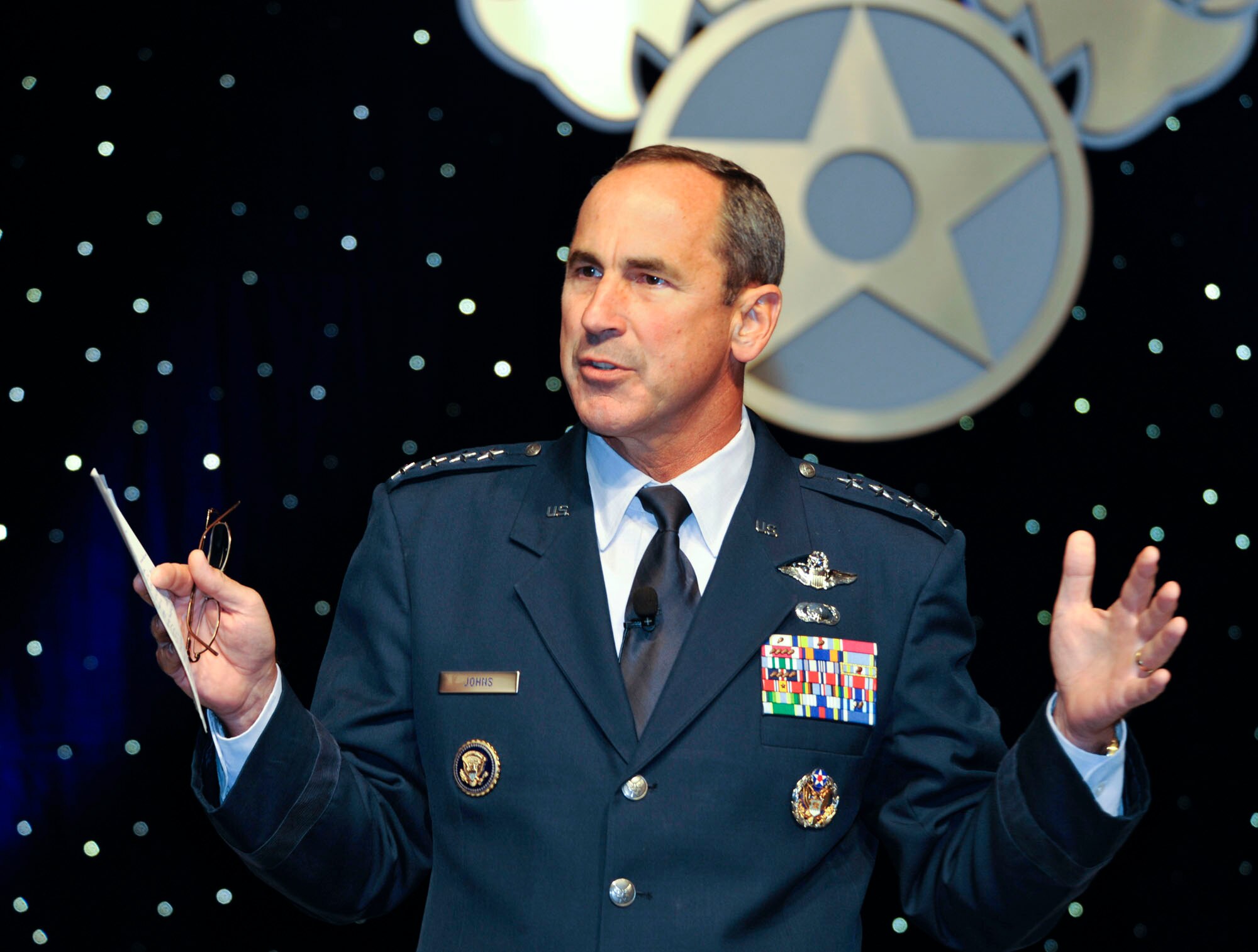 Gen. Raymond Johns, commander of Air Mobility Command, discusses recent mission requirements affecting his command resources with audience members at the Air Force Association annual Air and Space Conference and Technology Exposition Sept. 14, 2010, at National Harbor in Oxon Hill, Md. (U.S. Air Force photo/ Michael J. Pausic)