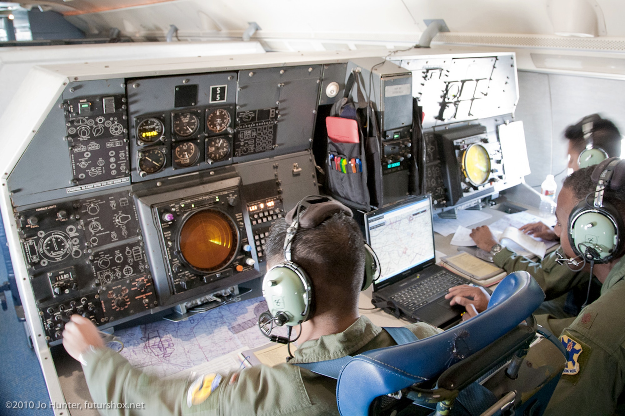 A combat systems officer trainer instructs students Sept. 1, 2010, aboard a T-43. The T-43, a CSO training aircraft since 1973, was officially retired Sept. 17, 2010. (Courtesy photo/Jo Hunter)