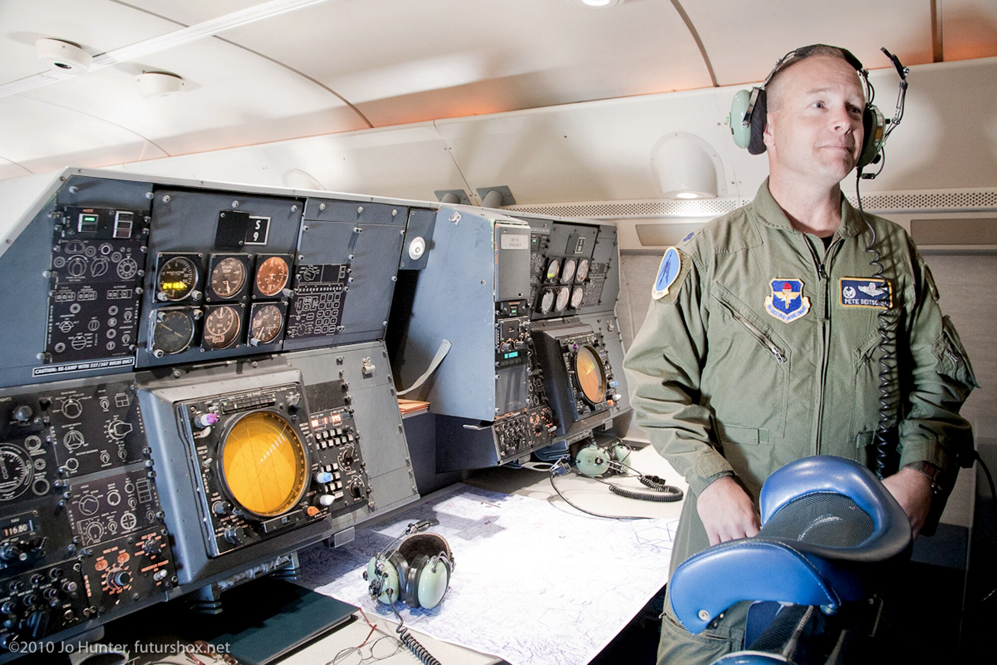 Lt. Col. Pete Deitschel stands in front of a combat systems officer training station Sept. 1, 2010, aboard a T-43. The T-43, a CSO training aircraft since 1973, was officially retired Sept. 17, 2010. Colonel Deitschel is the commander of the 562nd Flying Training Squadron. (Courtesy photo/Jo Hunter)