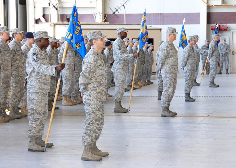 15th Expeditionary Mobility Task Force members stand at parade rest during  the 15th EMTF change of command ceremony on July 15th 2010 at Travis Air Force, California. (U.S. Air Force photo by Civ/Nan Wylie)