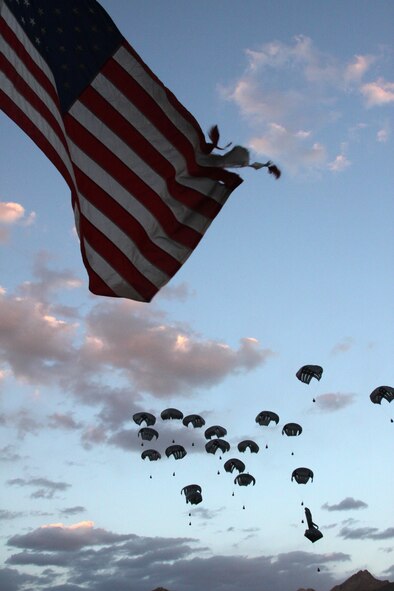 A cargo airdrop falls over Forward Operating Base Baylough, Afghanistan, during a delivery by a U.S. Air Force C-17 Globemaster III cargo aircraft to Red Tank, 1st Platoon, Delta Company, 1st Battalion, 4th Infantry Regiment on June 13, 2010. (U.S. Army Photo/Staff Sgt. William Tremblay) 