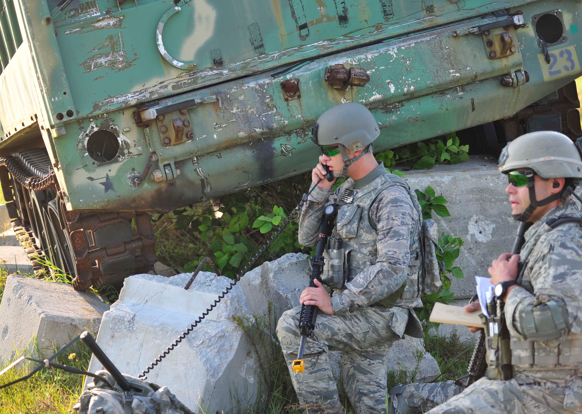 100914-F-4983M-149

AVON PARK, Fla. -- Technical Sgt. Hall (front) and Senior Airman Sigmon (back) relay their positions to their joint fires observers, Sept. 14, 2010 as part of Atlantic Strike 10-02. Atlantic Strike is a biannual Air Combat Command sponsored joint training exercise designed for the tactical employment of air power in support of joint terminal attack controller and joint fires observer integration through close air support. (Air Force photo/Staff Sgt. Patrick Mitchell)(RELEASED)
