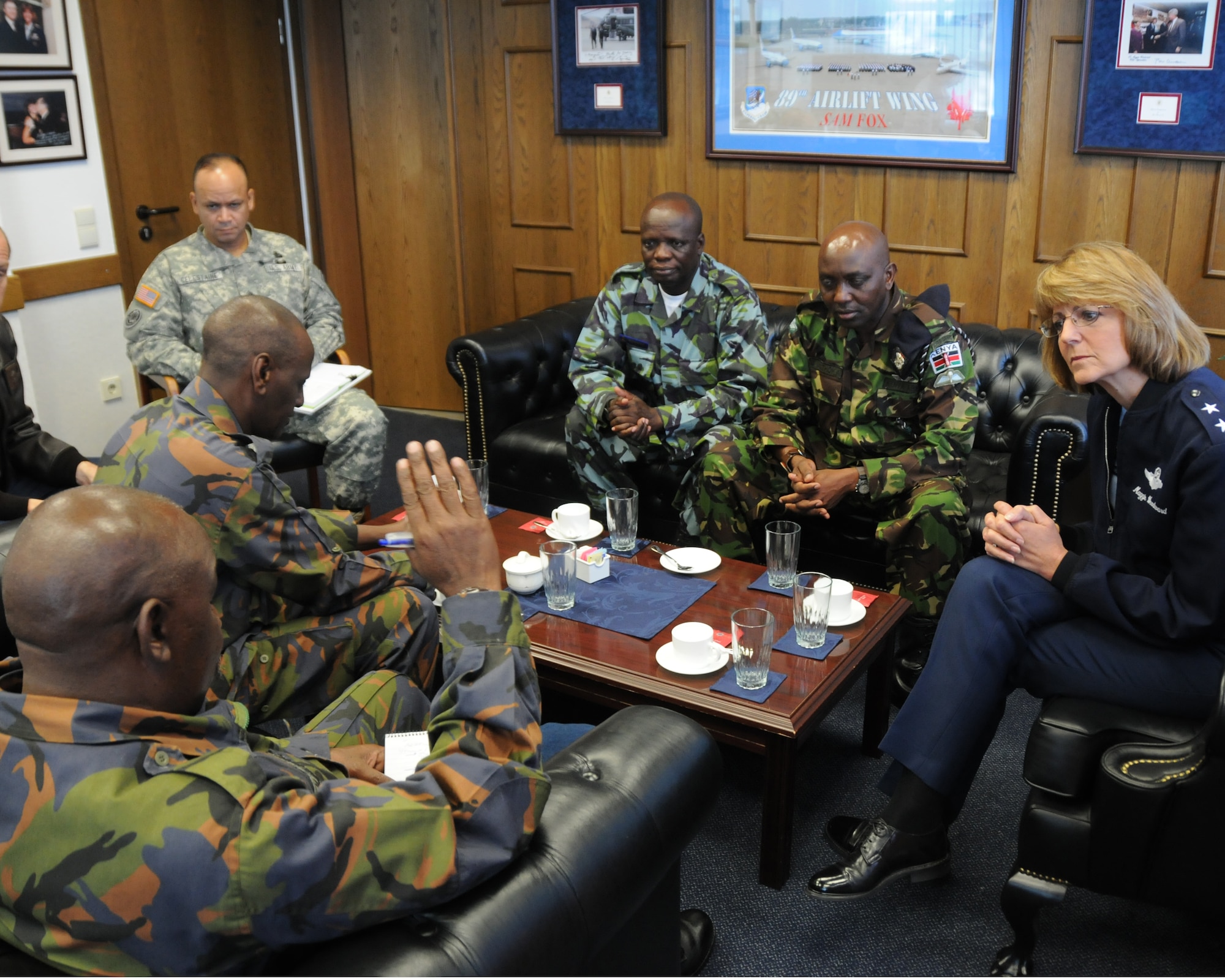 RAMSTEIN AIR BASE, Germany -- Major, Gen. Margaret H. Woodward (right); commander of 17th Air Force (Air Forces Africa) meets with sergeant majors from various branches of the Kenyan military while visiting the U.S. Africa Command on Sept 13. They toured the airman and non commission officer professional military education facilities and aircraft maintance inspection hanger. (U.S. Air Force photo by Staff Sergeant Jodi Leininger)