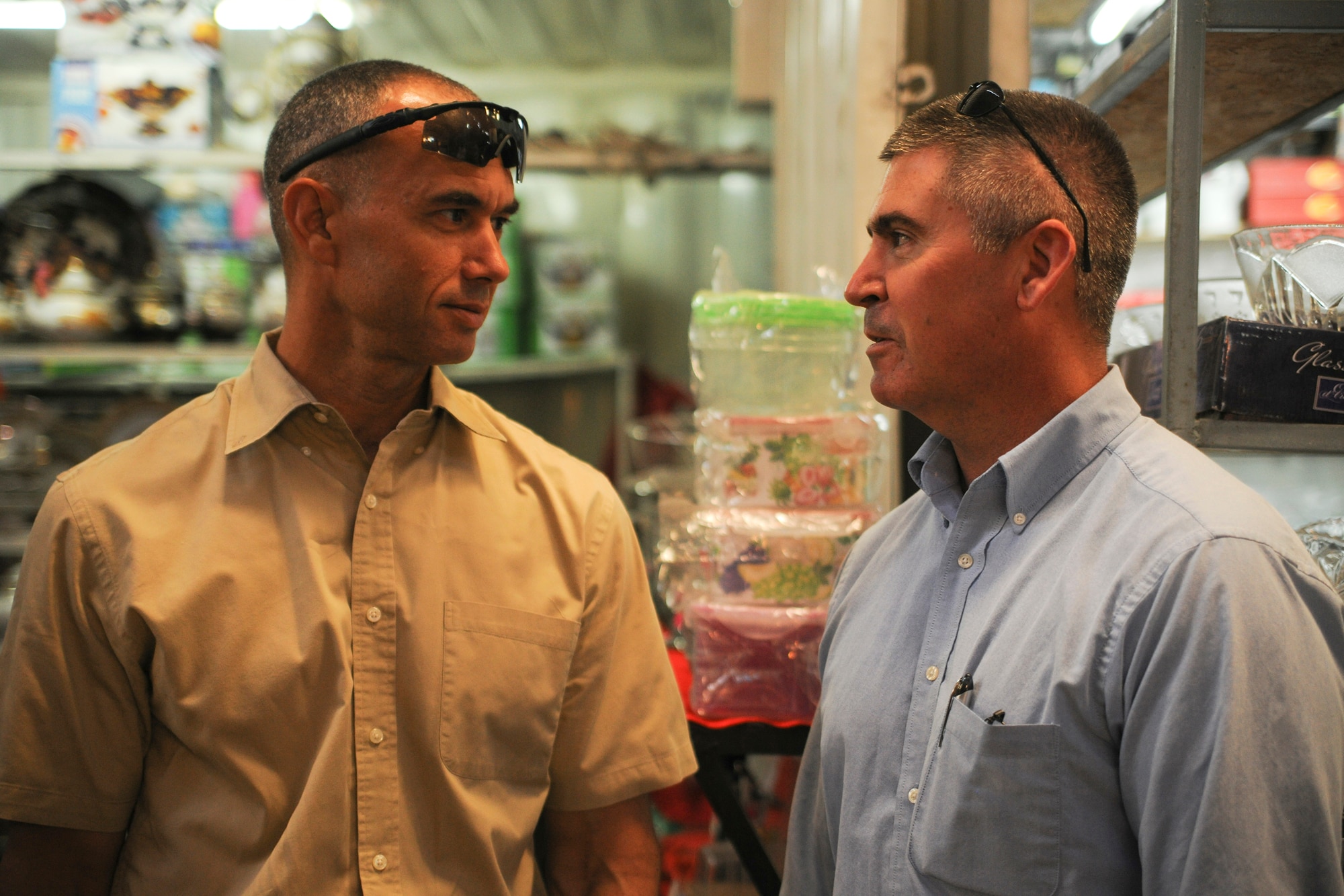 BISHKEK, Kyrgyzstan - Chief Master Sgt. Mark Villella, Air Forces Central Command Chief, speaks with Chief Master Sgt. James Lucas, 376th Air Expeditionary Wing command chief, while shopping for school furniture Sept. 15.  Chief Villella went on a Humanitarian Assistance mission with Airmen from the Transit Center at Manas and assisted in donating $10,000 worth of furniture for Marble Village Kindergarten.  (U.S. Air Force photo/Staff Sgt. Nathan Bevier)