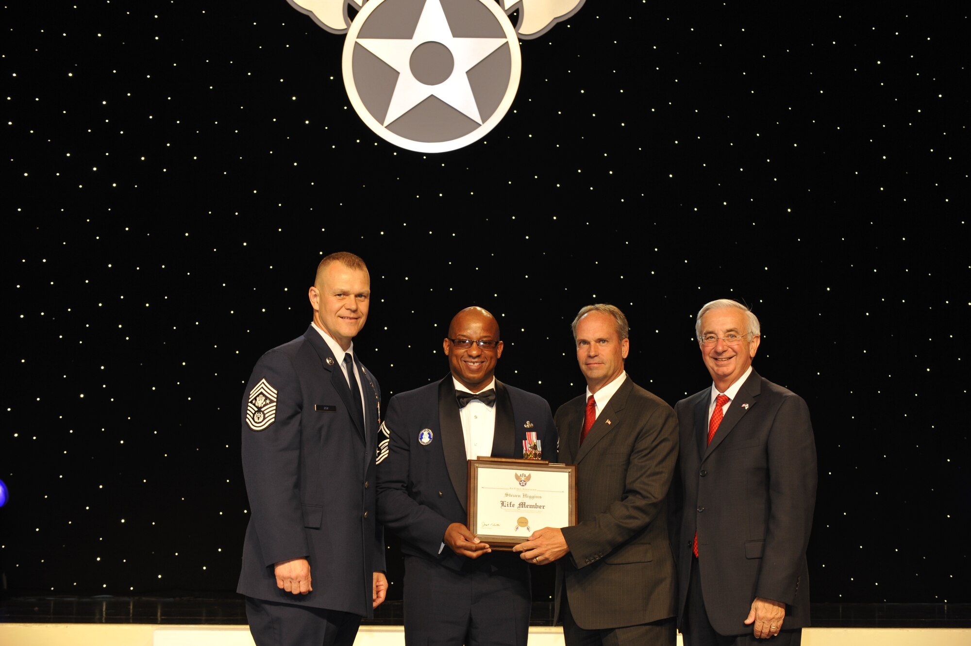 Senior Master Sgt. Steven Higgins (middle), 48th Communications Squadron superintendent of inspections, was recognized as one of the 12 Outstanding Airmen of the Year Sept. 13, 2010 during a dinner in Washington DC.

