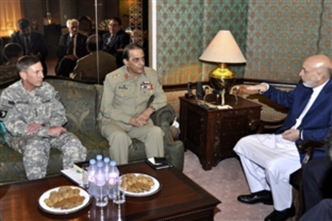 U.S. Army Gen. David H. Petraeus, left, commander of the International Security Assistance Force in Afghanistan, traveled to Pakistan to meet with Afghan President Hamid Karzai, right, and Pakistan's Chief of Army Staff Gen. Ashfaq Parvez Kayani, center, Sept. 16, 2010. The leaders engaged in a frank discussion about the security situation in Afghanistan and Pakistan that led to an agreement that both countries will work together to ensure peace for their nations.