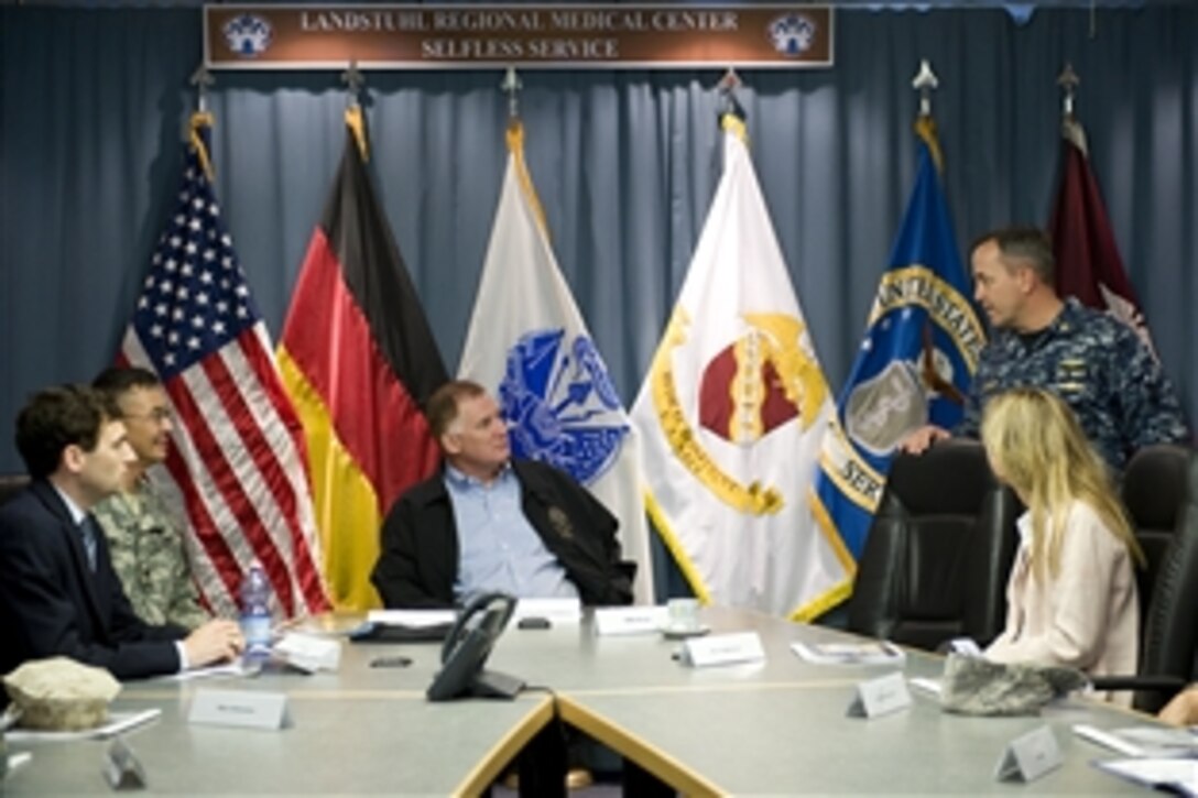 Deputy Defense Secretary William J. Lynn III receives a briefing during a visit to Landstuhl Regional Medical Center, Germany, Sept. 16, 2010.  Lynn met with hospital staff to discuss funding issues before meeting with wounded servicemembers, both U.S. and coalition, in several medical surgical wards and the intensive care unit.