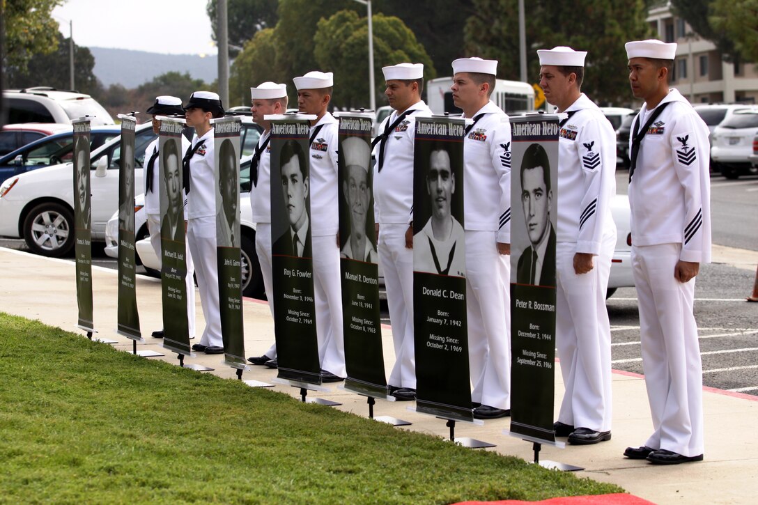 Sailors from Camp Pendleton's Naval Hospital stand at attention during the 20th annual Prisoner of War/Missing in Action Memorial Service at the Naval Hospital, Sept. 17, in memory of the eight navy corpsmen currently missing in action. Throughout the morning speakers including Captain Jeff Plummer, executive officer, Naval Hospital Camp Pendleton and Dr. George Pappas, a former World War II prisoner of war, gave compassionate words to the former MIA and POWs in attendance, and encouragement to the friends and family members of those who haven't found their way home.