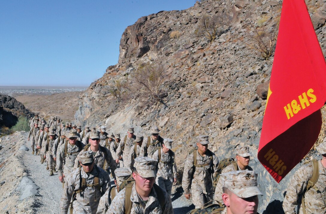 Headquarters and Headquarters Squadron Marines hike Telegraph Pass in Yuma Sept. 16, 2010, as part of the squadron’s noncommissioned officers appreciation day. Approximately 80 NCOs were led by the squadron’s commanding officer and sergeant major during the hike. The squadron followed the event with a pool party for its NCOs and held an NCO mess night Sept. 17, 2010.