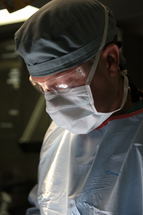 Navy Cmdr. Gordon G. Wisbach, native of San Diego, Calif., and surgeon with Continuing Promise 2010, operates on a 13-year-old Nicaraguan child during a repair of an umbilical hernia aboard the USS Iwo Jima, Sept. 17, 2010. Marines and Sailors of CP10 worked together to support surgical operations off the coast of Bluefields, Nicaragua. CP10 is a humanitarian civic assistance mission, where USS Iwo Jima personnel is providing medical, dental, veterinary, engineering support and disaster relief efforts to the Caribbean, Central and South America.