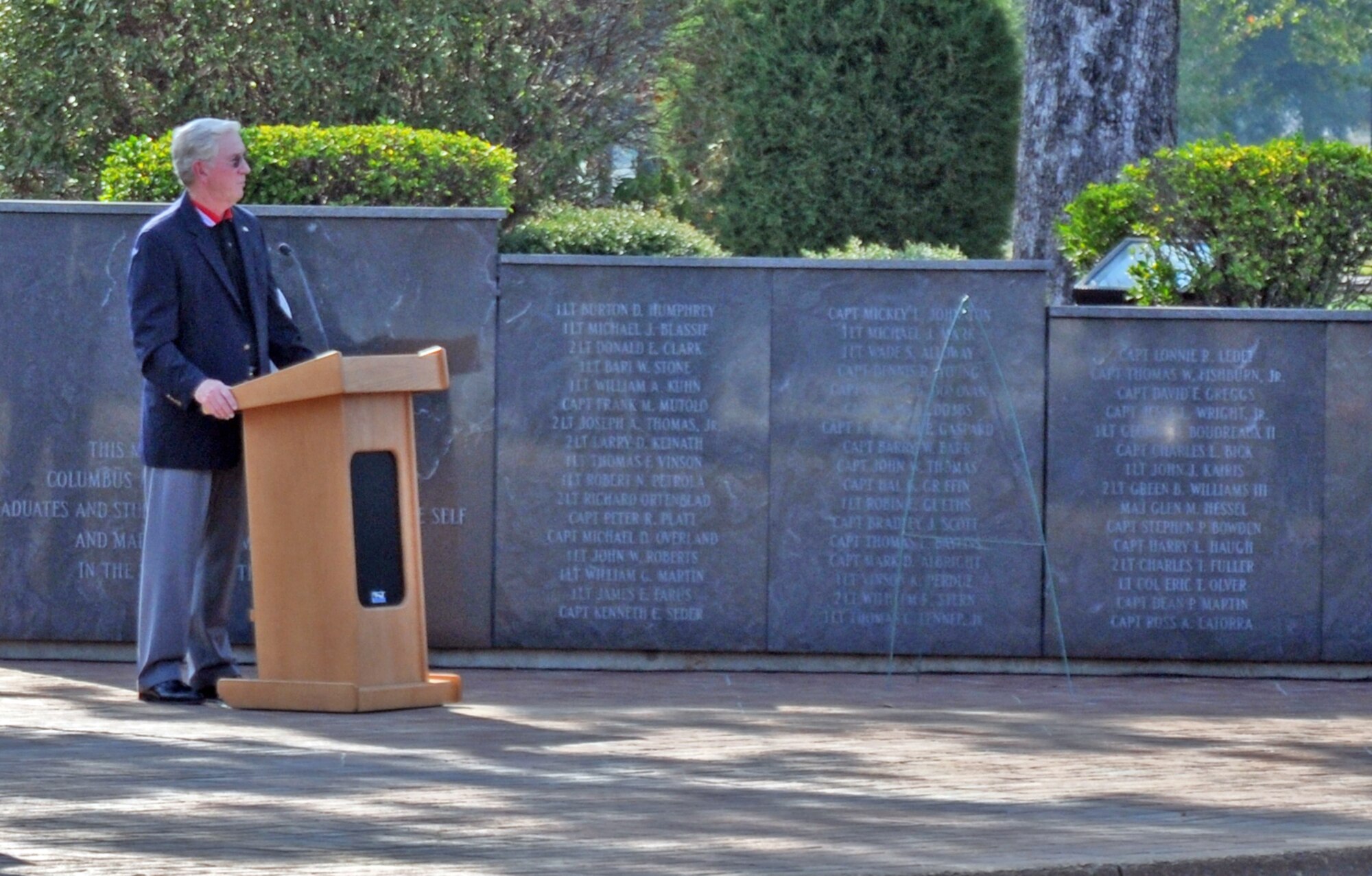 Retired Lt. Col. Richard “Gene Smith” speaks at the Plaza named after him at the POW/MIA Remembrance Ceremony, Sept. 17 at Columbus Air Force Base. Colonel Smith was a Vietnam War POW for nearly five and a half years and repatriated March 14, 1973. (U.S. Air Force photo/Staff Sgt. Jacob Corbin). 
