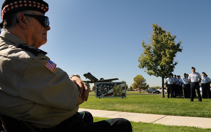 NELLIS AIR FORCE BASE, Nev.-- A Las Vegas veteran observes the  POW/ MIA recognition ceremony at Freedom Park Sept. 17. The ceremony included a dedication of a POW/MIA ceremonial wreath, the reciting of names of Nevada prisoners of war and those who are still missing, a three-volley salute and an A-10 formation fly by. (U.S. Air Force photo by Senior Airman Stephanie Rubi)