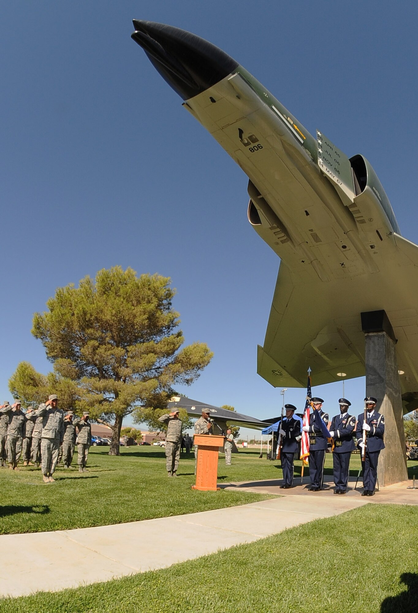 NELLIS AIR FORCE BASE, Nev.-- Members of the Nellis Honor Guard post the colors during the 2010 National Prisoners of War/Missing in Action Recognition Day Ceremony at Freedom Park Sept. 17. (U.S. Air Force photo by Senior Airman Stephanie Rubi) 

