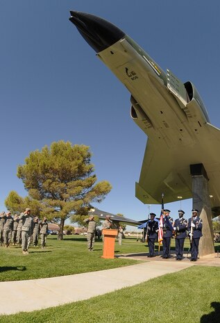 NELLIS AIR FORCE BASE, Nev.-- Members of the Nellis Honor Guard post the colors during the 2010 National Prisoners of War/Missing in Action Recognition Day Ceremony at Freedom Park Sept. 17. (U.S. Air Force photo by Senior Airman Stephanie Rubi) 

