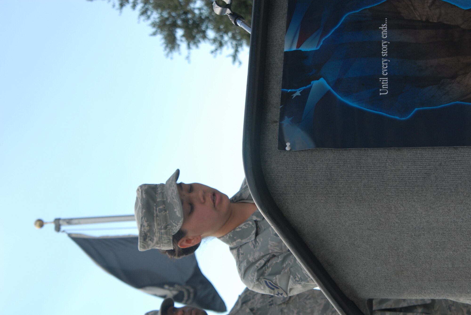 Airman 1st Class Heimy Pasley, 17 Force Support Squadron recites the names of Prisoners of War/Missing in Action servicemembers during a 24 hour vigil held at the POW/MIA memorial here Sept. 17. There are currently 1,741 POW/MIAs listed by the Defence Department. ( U.S. Air Force photo/Airman 1st Class Jessica D. Keith)