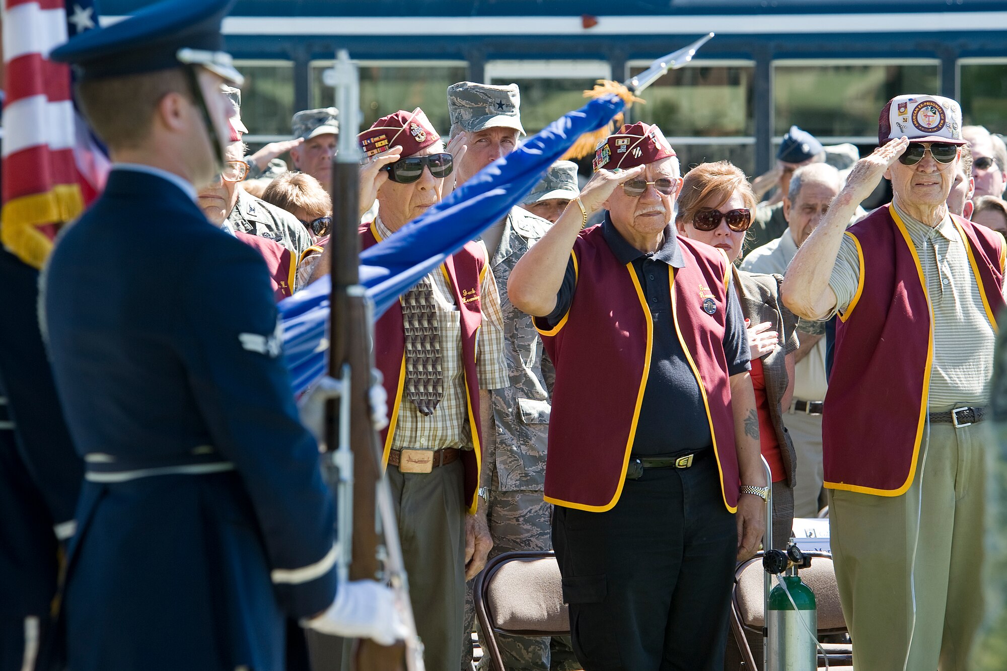NELLIS AIR FORCE BASE Nev.-- Members of the the 7-11 Chapter of American Ex-Prisoners Of War render a salute during the playing of the national anthem at the 2010 National Prisoners of War/Missing in Action Recognition Day Ceremony at Freedom Park Sept. 17. (U.S. Air Force photo by Lawrence Crespo) 



 