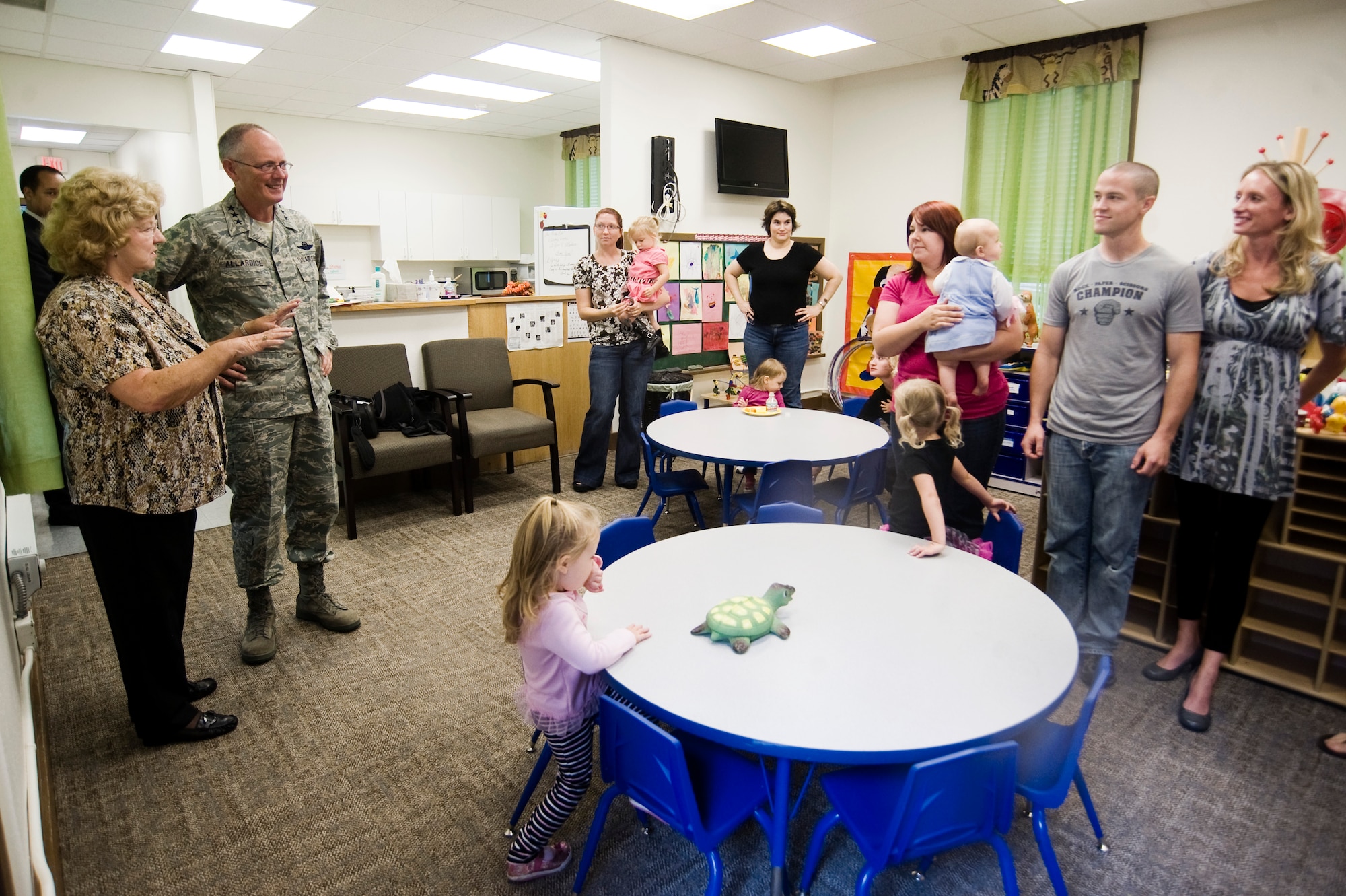 Lt. Gen. Robert R. Allardice, left, 18th Air Force Commander, and Mrs. Betty McBee, the Escape Zone coordinator, take a tour of the Escape Zone and meet familes Sept. 17 at Joint Base Lewis-McChord, Wash. (U.S. Air Force Photo/Abner Guzman)
