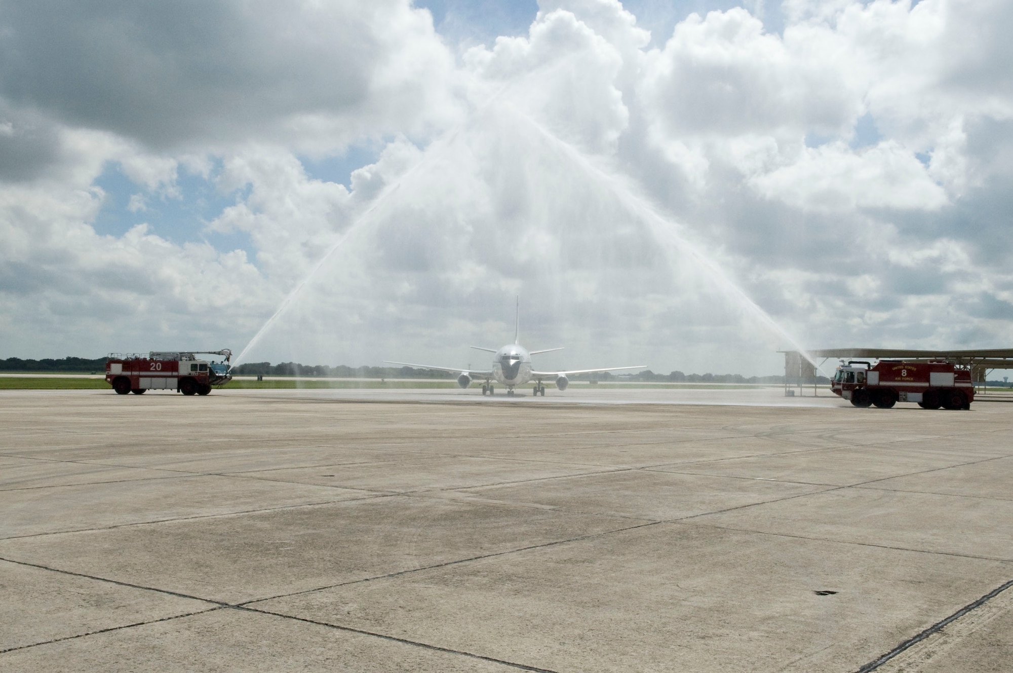 The last T-43 combat systems officer trainer is hosed down by fire trucks after its “fini” flight Sept. 17, 2010, at Randolph Air Force Base, Texas. The T-43, a version of the Boeing 737, retires from the Air Force inventory after 37 years of service as a navigator training platform. The CSO training mission will be moving to Naval Air Station Pensacola, Fla.  (U.S. Air Force photo/Steve White)