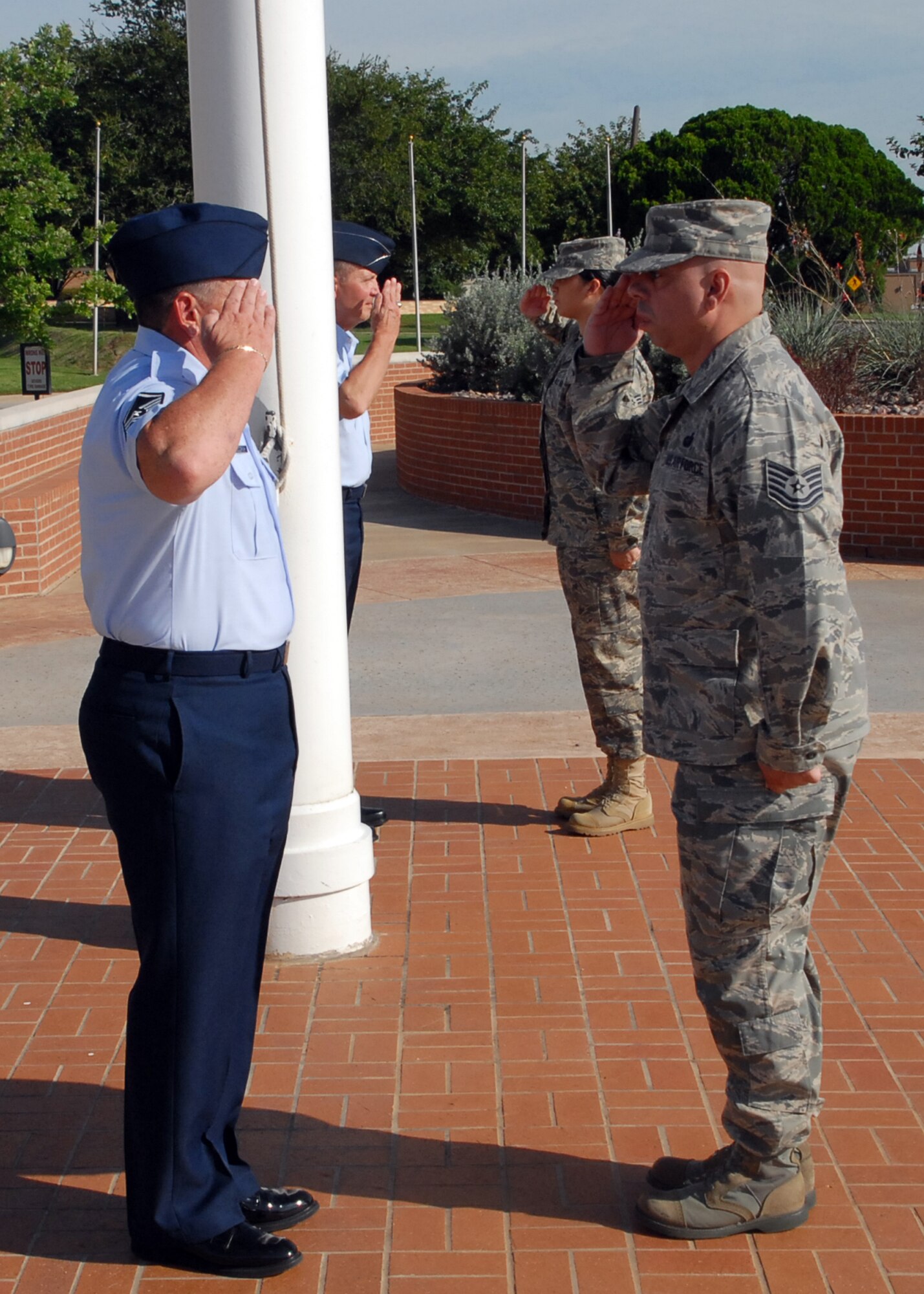Volunteers for the POW/MIA Day Flag Vigil report and relieve the current detail Airmen Sept. 17 at the flag pole in front of the 82nd Training Wing command building at Sheppard Air Force Base, Texas.  More than 125 members of Team Sheppard volunteered to stand at parade rest under the POW/MIA and U.S. flags for a 10-minute rotation.  The vigil lasted from 7 a.m. to 5 p.m.  (U.S. Air Force photo/LouAnne Sledge)