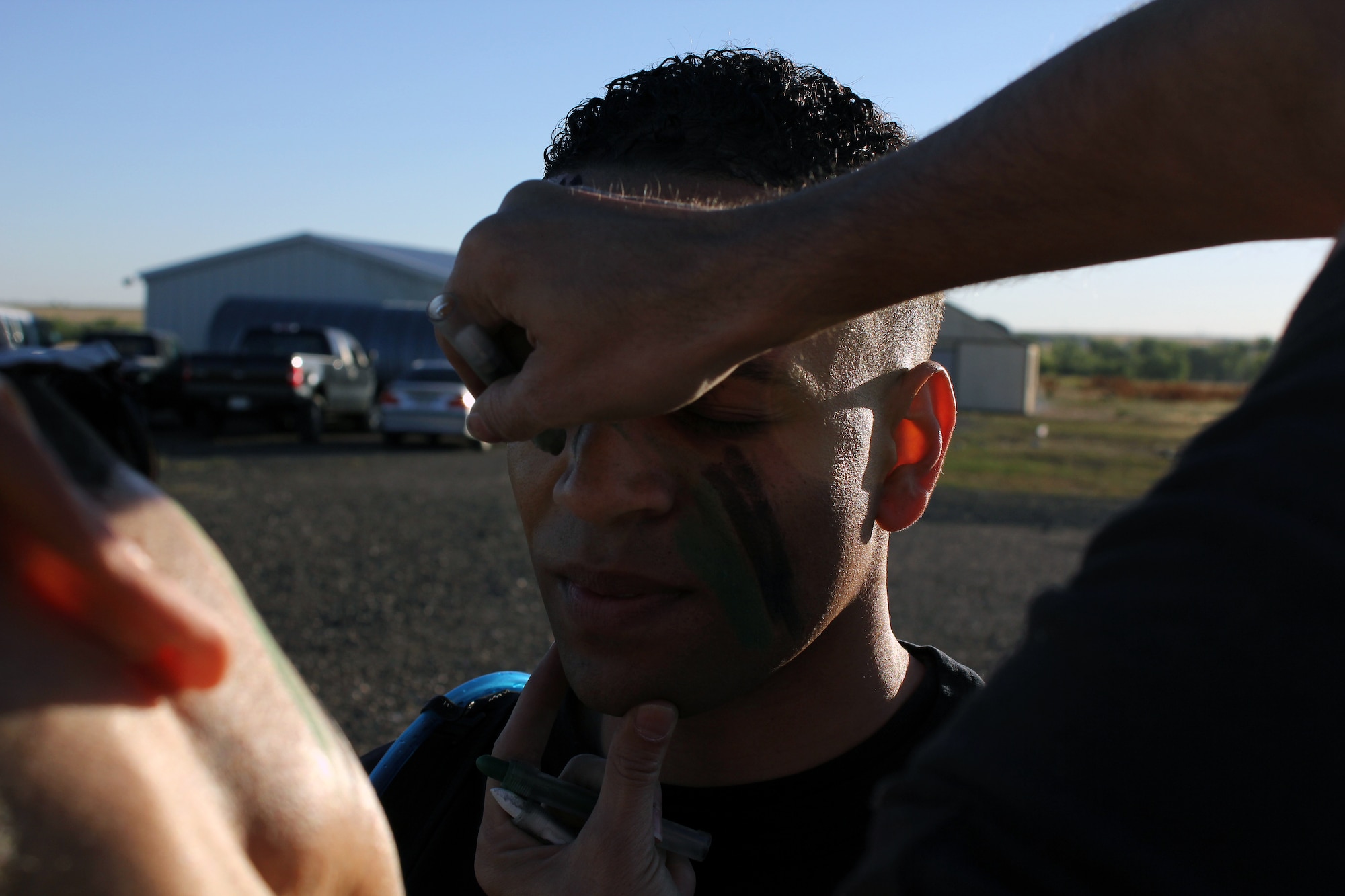 Tech. Sgt. Juan Williams prepares for the Air Reserve Personnel Center's Warrior Challenge on Sept. 10. Nearly 100 Airmen participated in the competition which featured 13 stations of physical and team-building challenges. (U.S. Air Force photo by Senior Master Sgt. Tom Kimball)