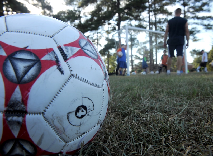 MOODY AIR FORCE BASE, Ga. -- A soccer ball sits while a youth soccer team practices here Sept. 16. Soccer is one of many sports that are part of the Moody Youth Sports Program, which is designed to help children develop social skills as well as keeping them physically active throughout the year. (U.S. Air Force photo/Airman 1st Class Benjamin Wiseman)