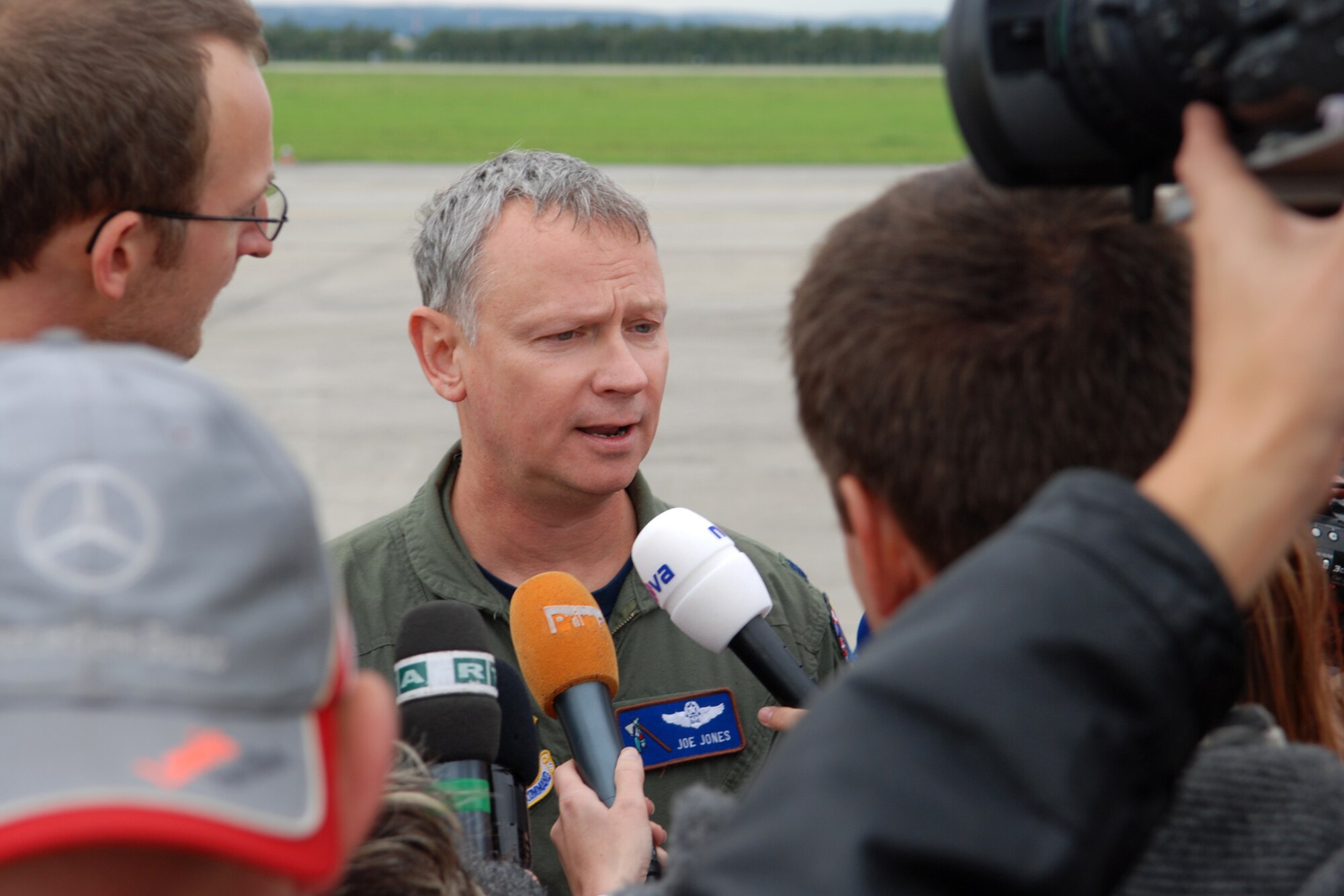 Lt. Col. Joseph Jones, commander, 93rd Bomb Squadron fields questions from the media at the Leos Janacek Ostrava Airport, Ostrava, Czech Republic, Sept. 15, 2010. A B-52 Stratofortress, its crew and support personnel traveled from Barksdale Air Force Base, La., to the Czech Republic in support of the 10th NATO Days in Ostrava & 1st Czech Air Force Days Air Show, which is scheduled for Sept 18-19, 2010. The historic landing marked the first ever for a B-52 in the Czech Republic. (U.S. Air Force photo/Master Sgt. Greg Steele) 