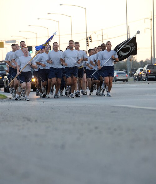 MOODY AIR FORCE BASE, Ga. -- Moody members came together to participate in this year’s Prisoner of War/Missing in Action Recognition Day run here Sept. 17. The 23-mile run was split into one-mile segments and at each segment, the POW/MIA guidon was passed on. (U.S. Air Force photo/Airman 1st Class Benjamin Wiseman)