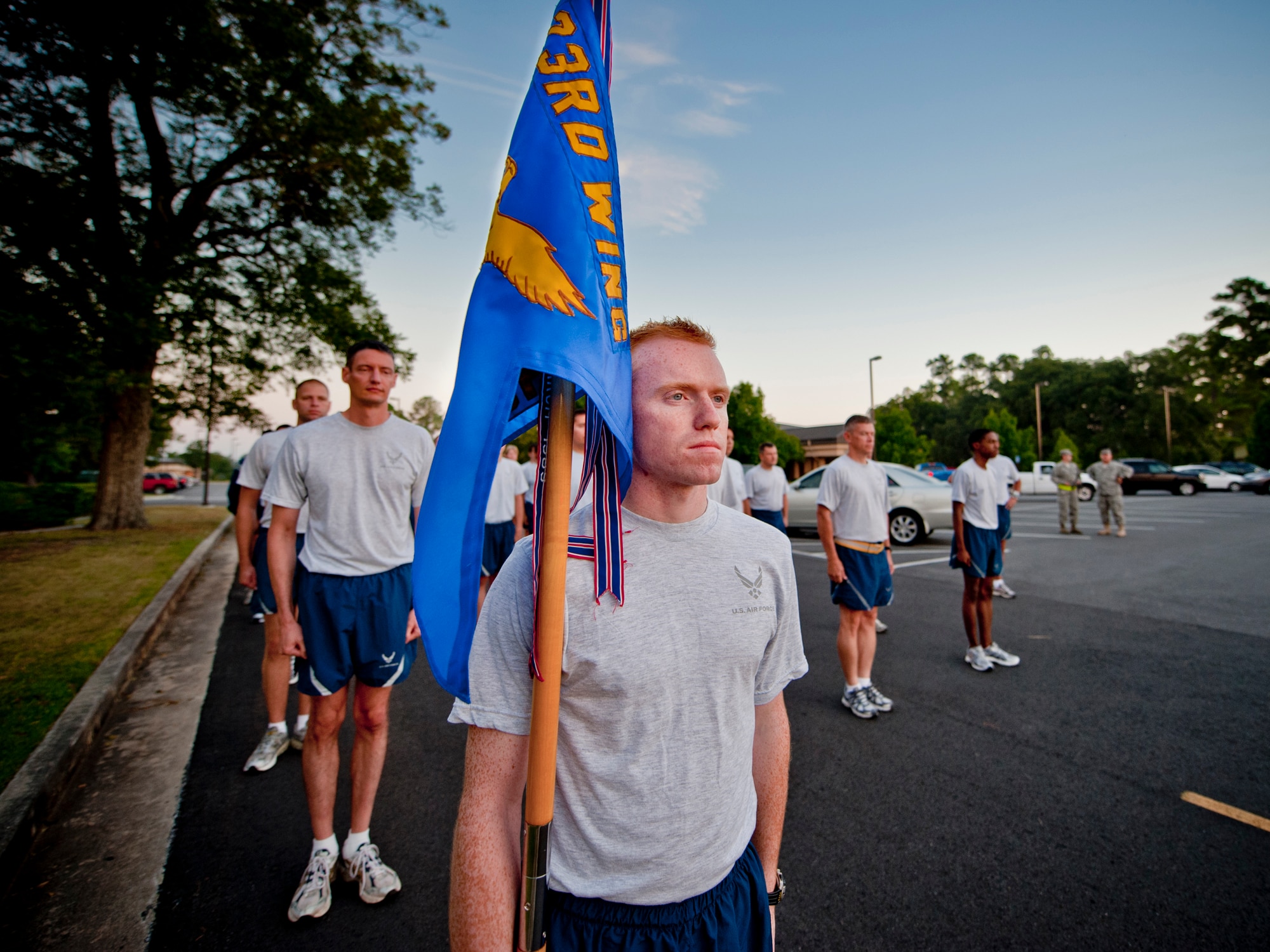 MOODY AIR FORCE BASE, Ga. -- 2nd Lt. Eric Hulshizer, 23rd Comptroller Squadron financial services officer, bears the unit guidon in preparation for this year's Prisoner of War/Missing in Action Recognition Day run here Sept. 17. Approximately 300 Airmen participated in the 23-mile run. (U.S. Air Force photo/Senior Airman Jamal D. Sutter)