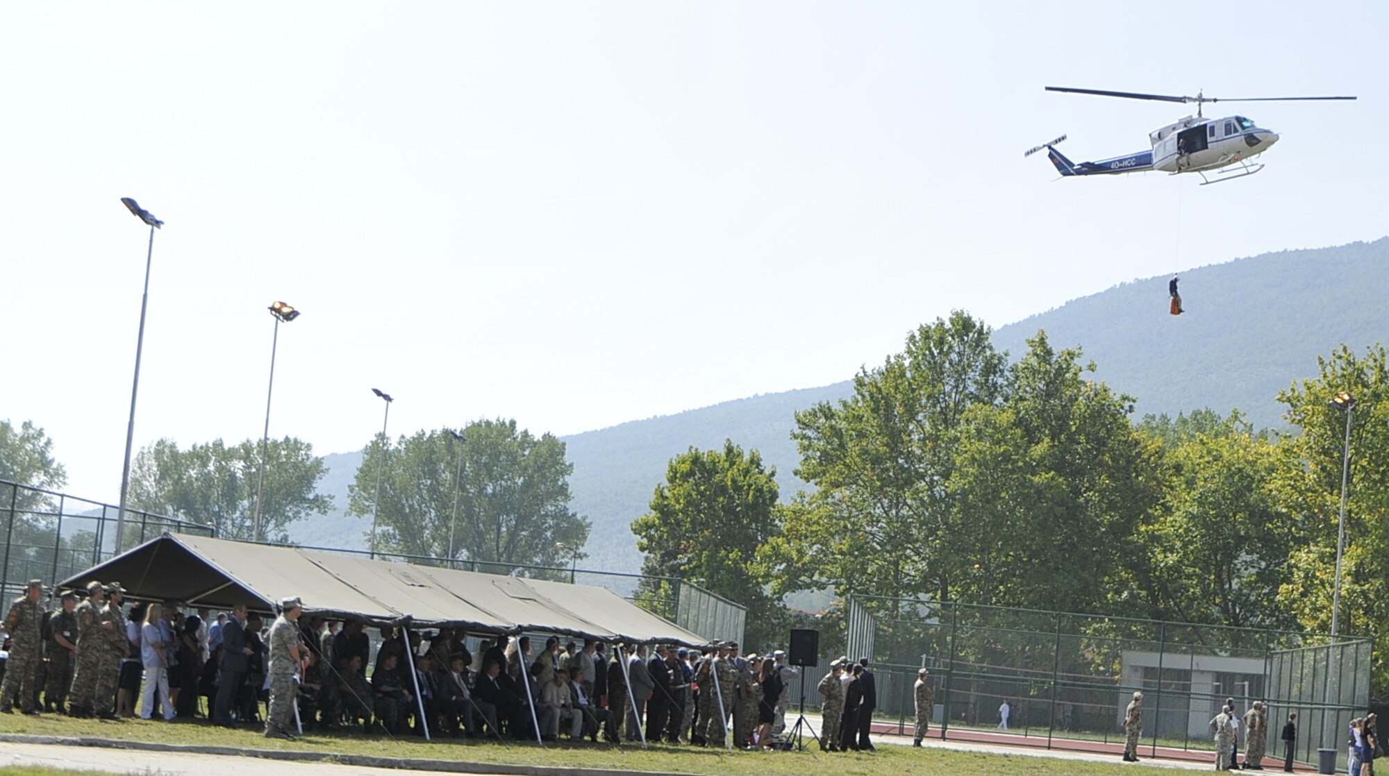 Montenegrin ministers, flag officers of participating nations and other distinguished visitors watch an air evacuation demonstration during a mock bridge explosion that is part of MEDCEUR 10, a medical training exercise in central and eastern Europe, at Danilovgrad Army Base, Montenegro, Sept. 17. More than 100 visitors came to see approximately 250 servicemembers from ten nations participate in five medical exercise scenarios. For more information, go to www.usafe.af.mil/medceur.asp and www.odbrana.gov.me. (U.S. Air Force photo/Airman 1st Class Tiffany Deuel)