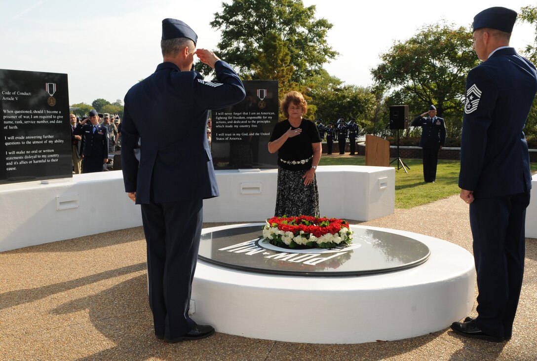 LANGLEY AIR FORCE BASE, Va. – Col. Matt Molloy, 1st Fighter Wing commander, renders a salute after laying a ceremonial wreath on the Prisoners of War/Missing in Action memorial Sept. 17. Team Langley honored our nation’s POWs and MIA through a series of ceremonies and events Sept. 16 and 17, paying respect to those who made, and continue to make, the ultimate sacrifice. (U.S. Air Force photo/Staff Sgt. Tabitha Kuykendall) (RELEASED)