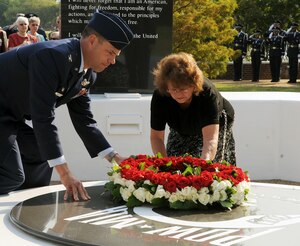 LANGLEY AIR FORCE BASE, Va. – Col. Matt Molloy, 1st Fighter Wing commander, and Sonja Dillaman, daughter of prisoner of war John Langley James, lay a ceremonial wreath on the POW/MIA memorial Sept. 17.  Team Langley honored our nation’s POWs and missing in action through a series of ceremonies and events Sept. 16 and 17, paying respect to those who made, and continue to make, the ultimate sacrifice. (U.S. Air Force photo/Staff Sgt. Tabitha Kuykendall) (RELEASED)
